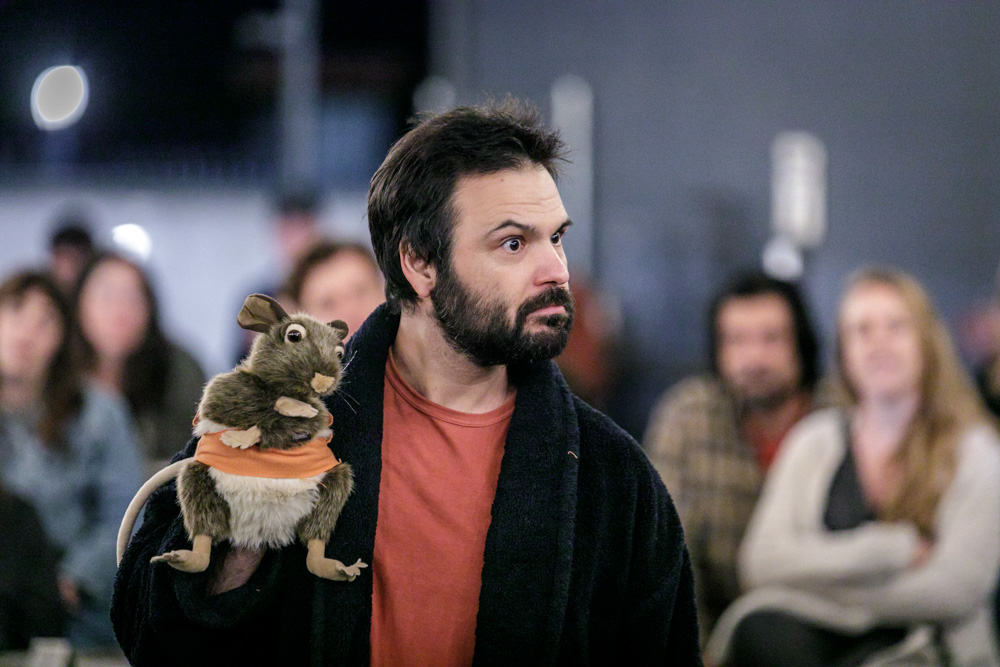 Performing as Barnadine with rat puppet in Measure for Measure